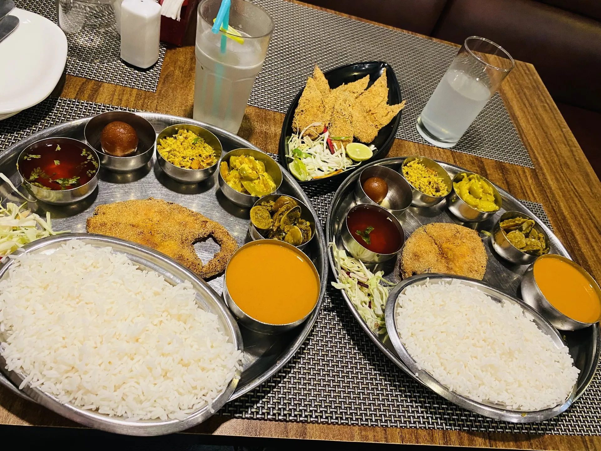 A Goan fish thali with rice, fish curry, fried kingfish, vegetables and sol kadhi