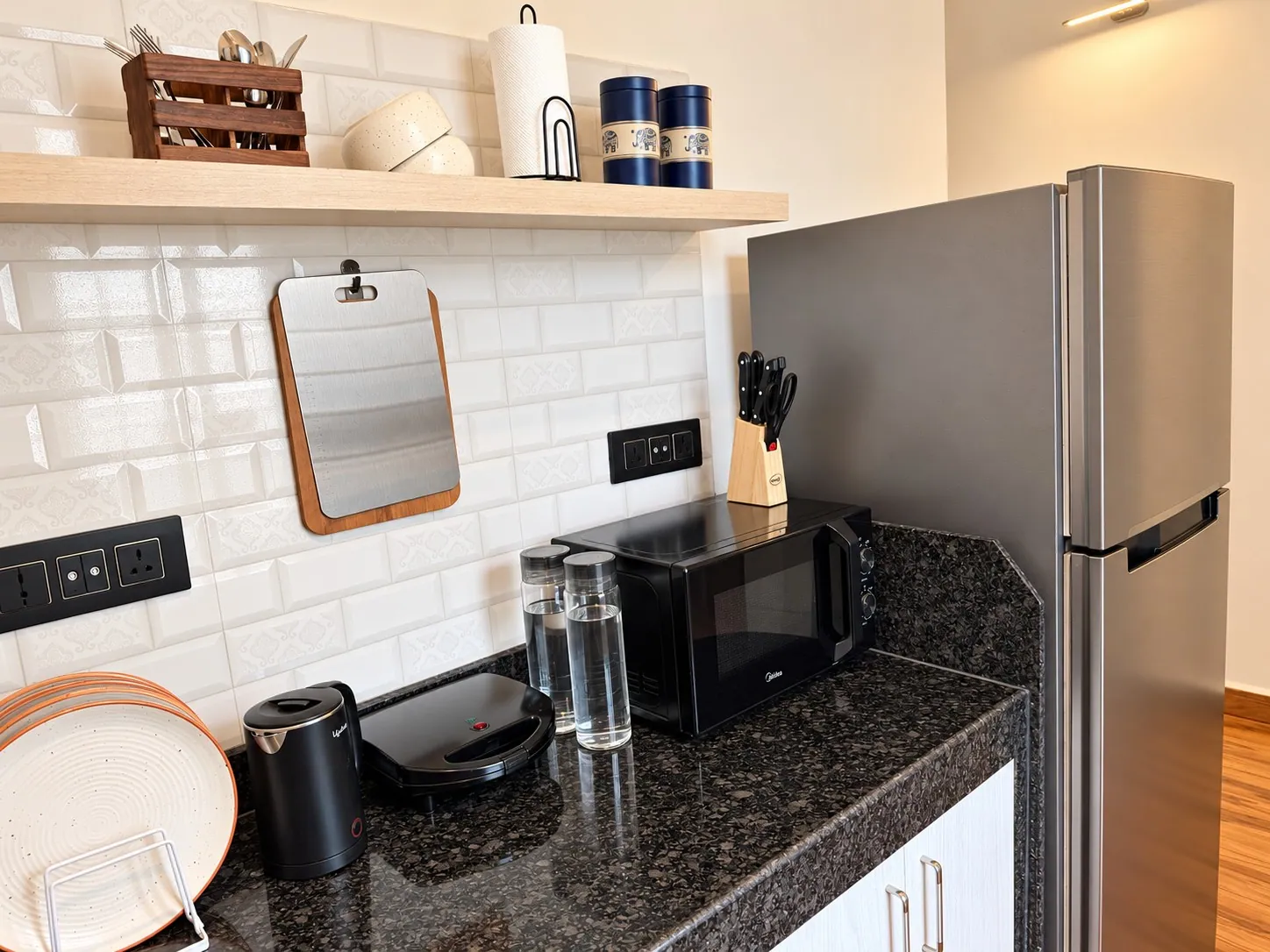 Rivara's kitchenette with its induction hob, microwave and fridge
