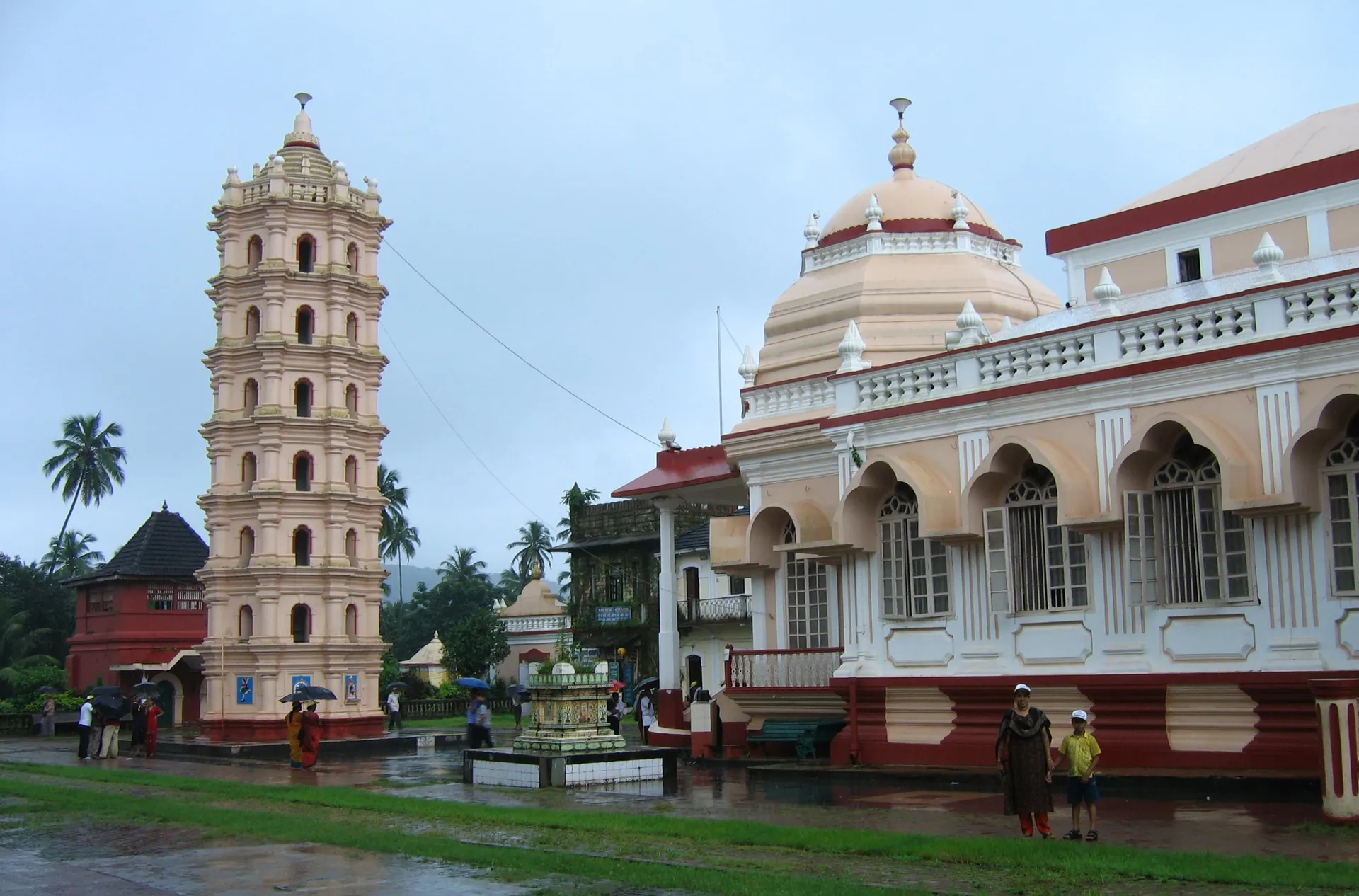 The Shri Mangueshi temple and its lamp tower near Ponda on a rainy day